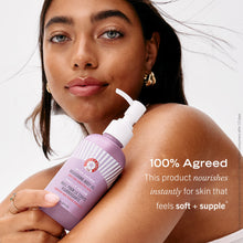 Model with After-Shower Nourishing Body Oil.  100% Agreed that this product nourishes instantly for skin that feels soft + supple.