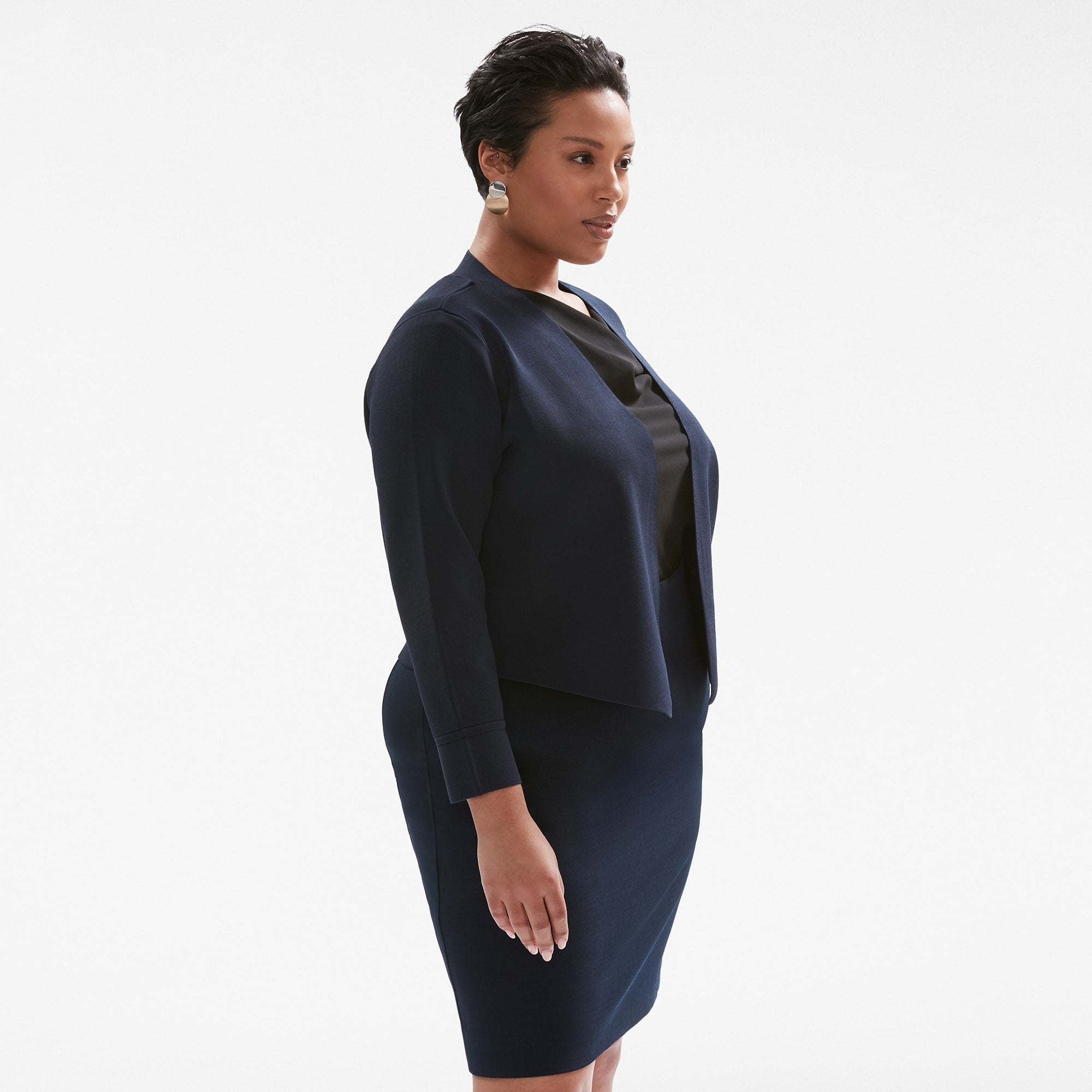 front image of a woman wearing the sant ambroeus jardigan in navy | Exclude