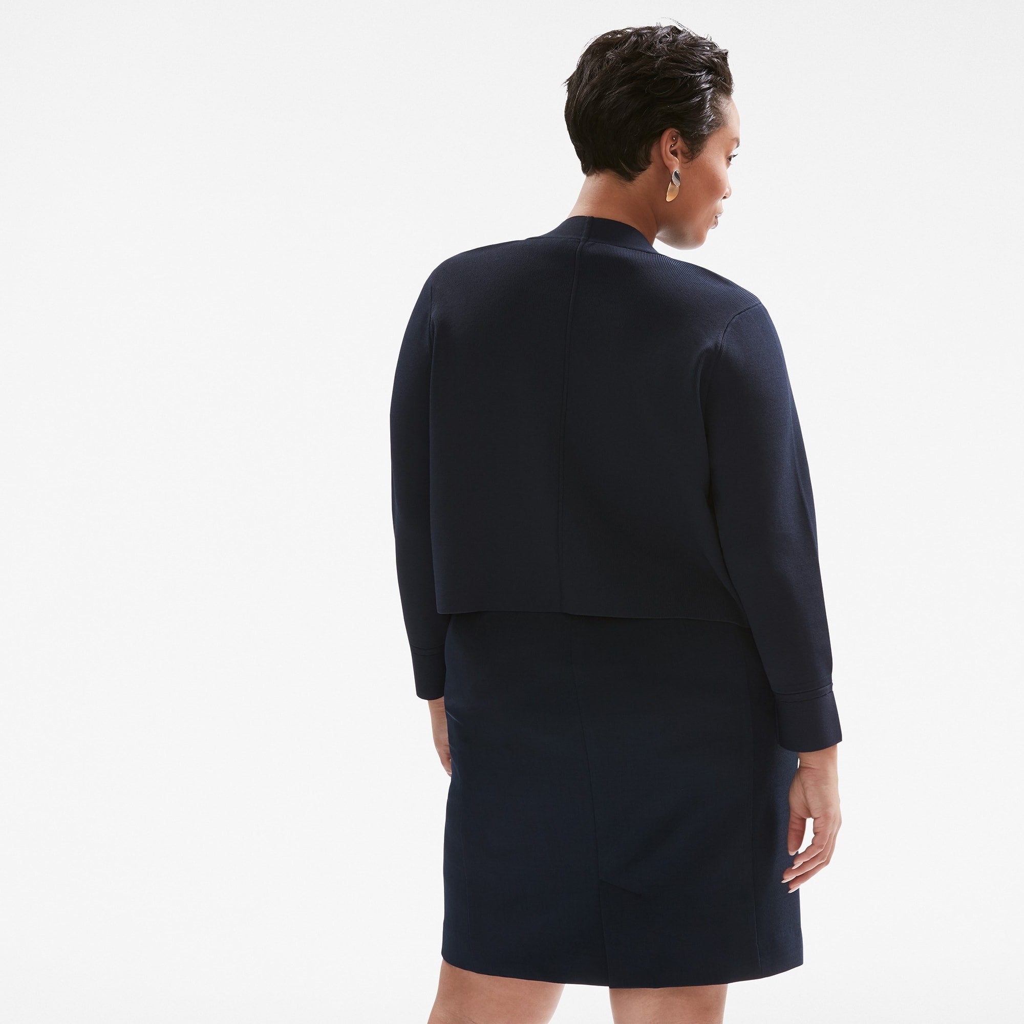 front image of a woman wearing the sant ambroeus jardigan in navy | Exclude