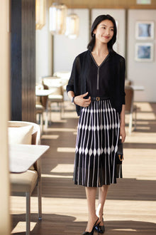 Hollowed-out Embossed Texture Skirt | Black