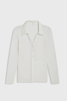 Sheer white top on a white background