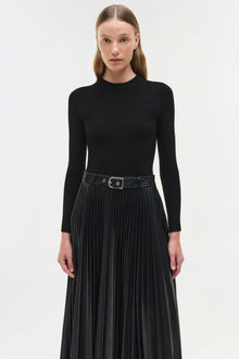 Black knit midi dress with long sleeves, pleated skirt, and belted waist.