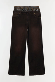 Dark indigo denim jeans with dual waistband detail in contrasting leather and denim, five-pocket construction, and wide-leg s