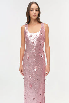 Sleeveless mauve sequin gown with scattered silver and rose gold embellishments and a scoop neckline.