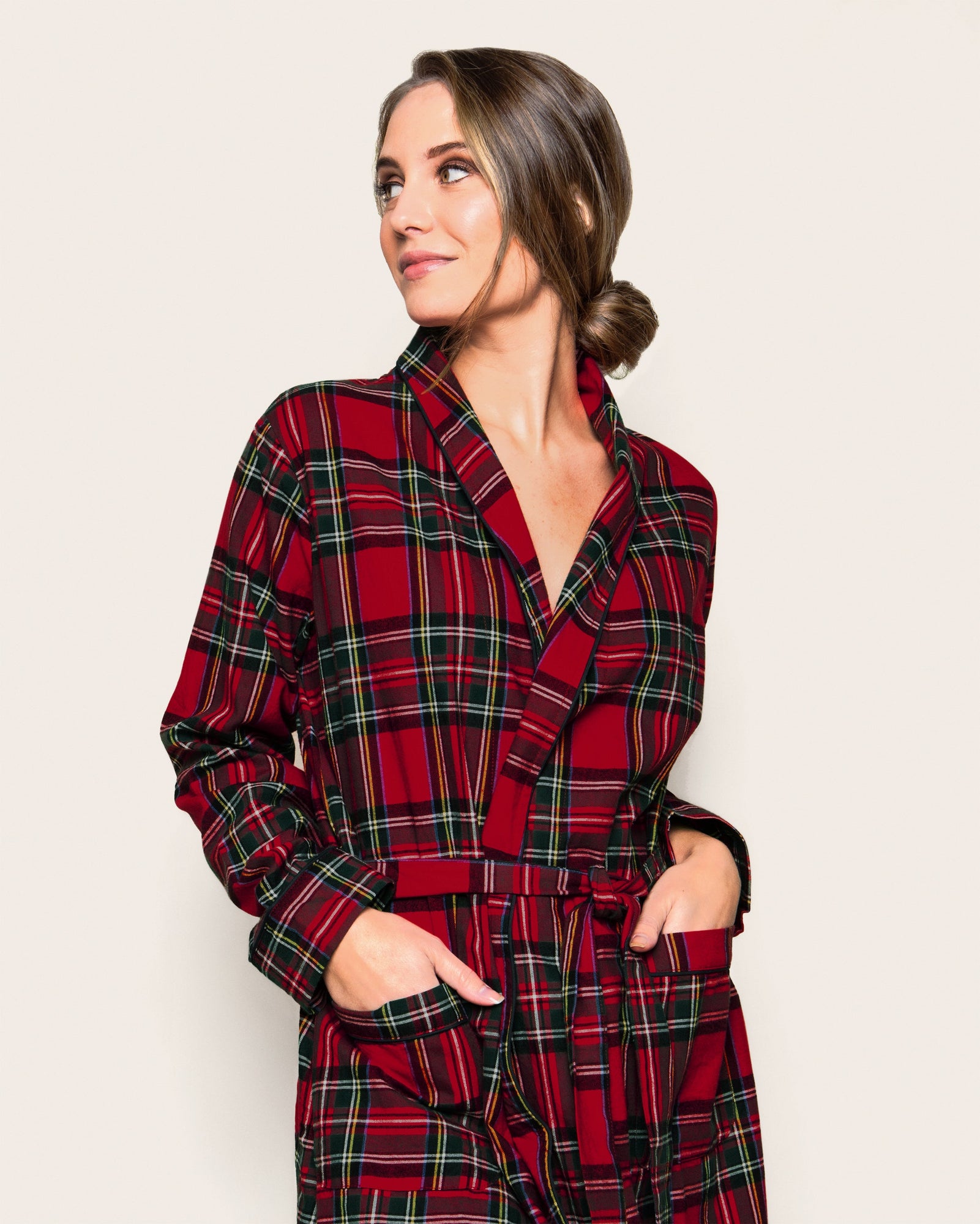 The Women's Brushed Twill Robe in Imperial Tartan features a red plaid pattern, long sleeves, a shawl collar, front pockets, and a matching waist tie, shown flat on a white background.