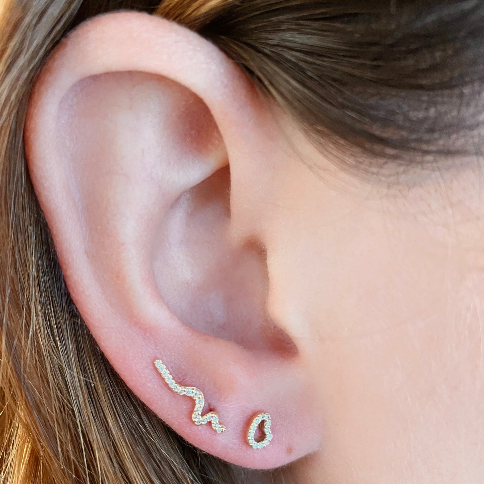 14K yellow Full Pavé Small Ripple Climber Earring on an ear styled with the ripple studs with full pavé