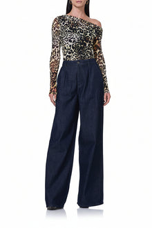 women's long sleeve top with draped neckline in animal print