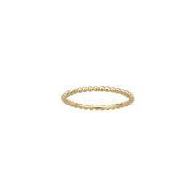 14k gold bead ring on white background