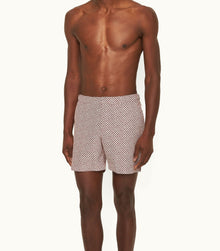 Bulldog Geo Print Mid-Length Swim Shorts | Copper Red/White Sand