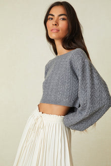 Crew Neck Cashmere Blend Sweater with long blouson sleeves and a cropped hem.