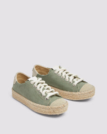 Top view of P448 green canvas low-top sneaker, highlighting the white rope laces, green canvas fabric upper, and organic jute sole with amber rubber tread.