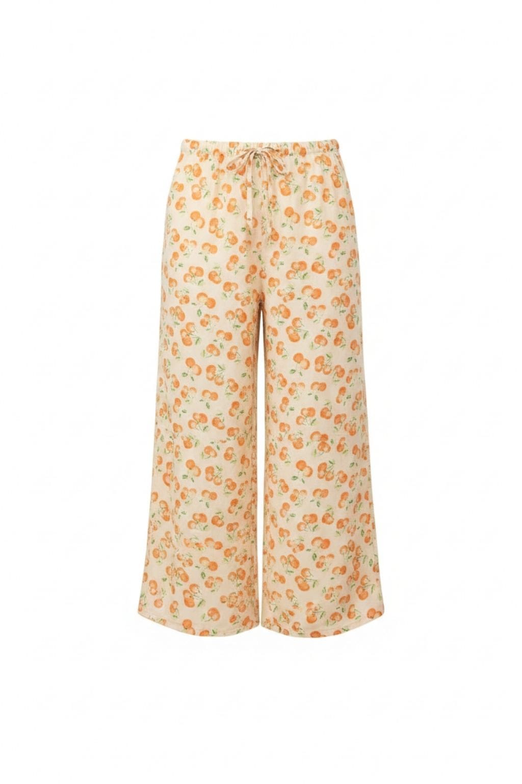 Cream wide-leg pants with orange fruit print and drawstring waist.