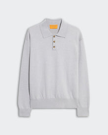 Allday Polo - Stone, a soft light gray long-sleeve polo knit with a relaxed fit, featuring a classic pointed collar, four-button placket, and ribbed cuffs and hem, displayed flat on a neutral background.