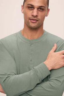 Model is wearing Henry TENCEL Modal Long PJ Set in Eucalyptus
