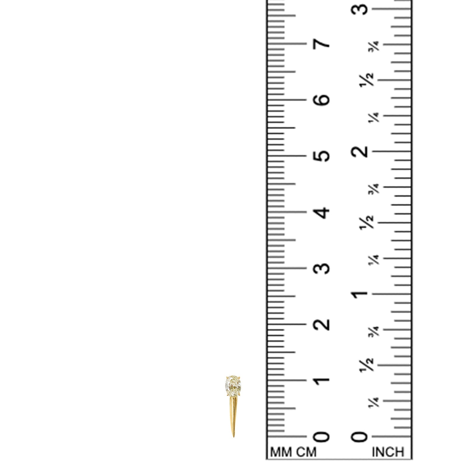 diamond with spike stud earring next to ruler