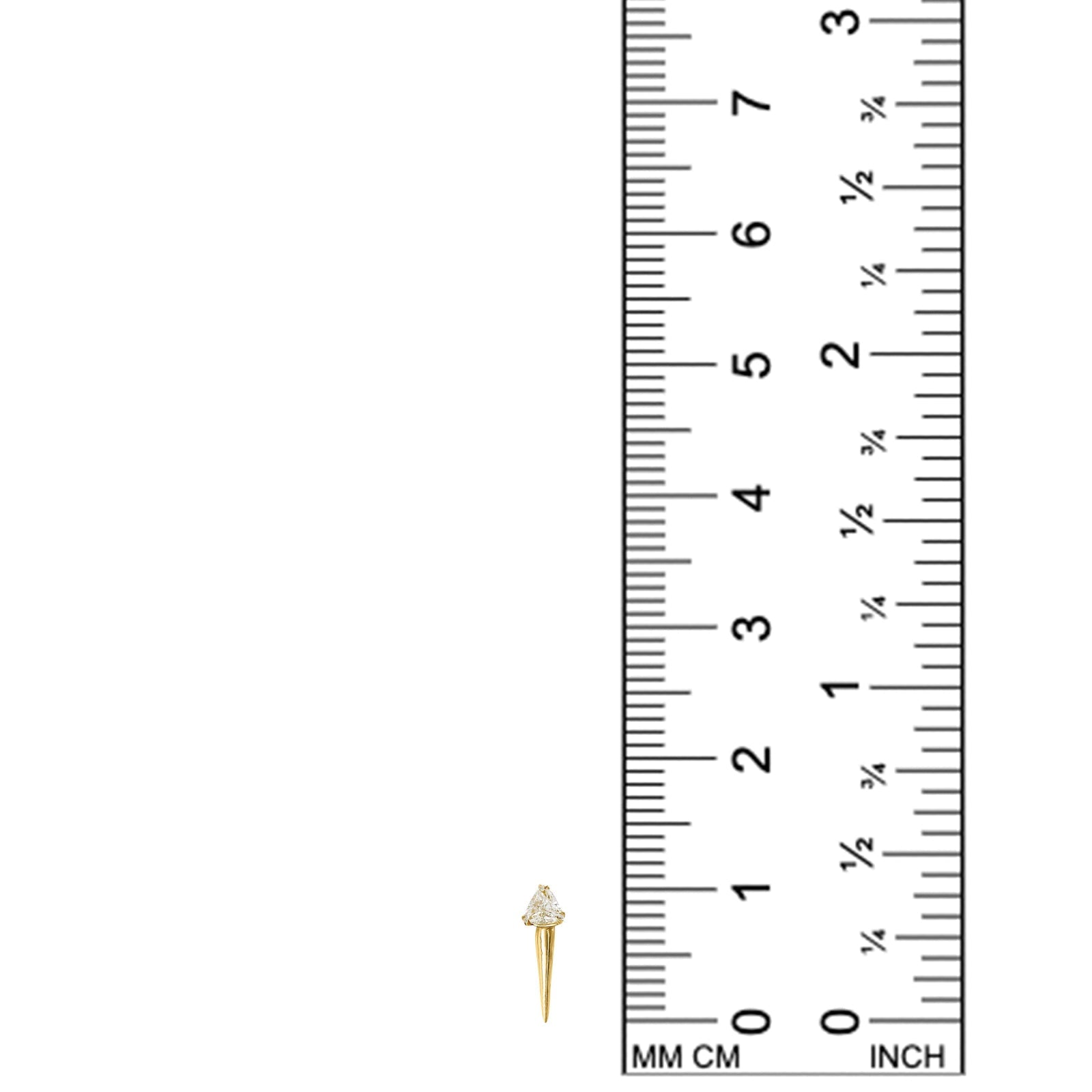 diamond with spike stud earring next to ruler
