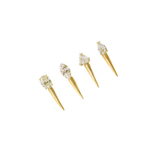 14k gold Diamond Foundry x AP Diamond Spike Studs on a white background