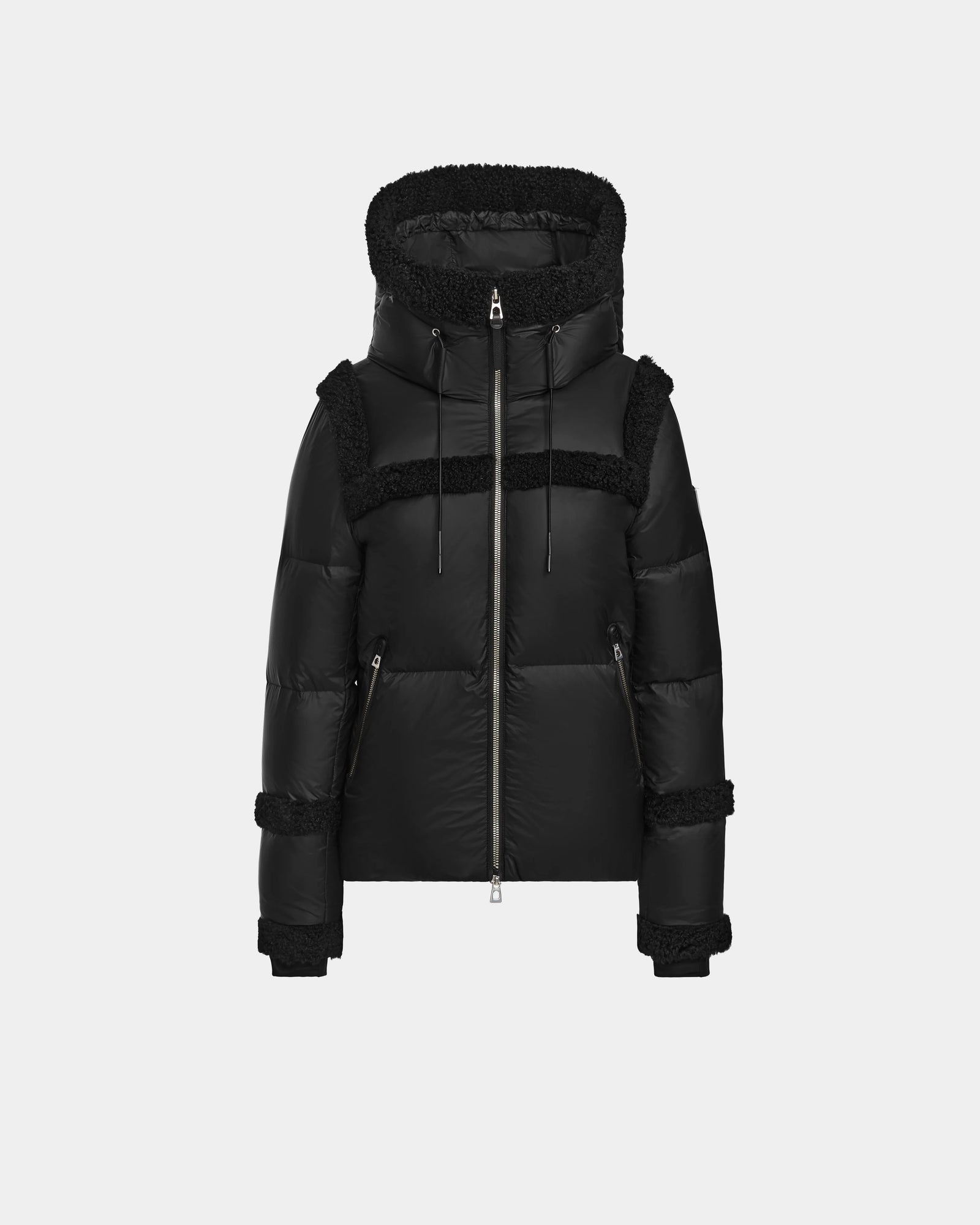 The Rudsak JULIANA - L124509 Black/Black is a women’s short down puffer jacket with a hood, front zipper, shearling trim, zippered side pockets, and a sleek quilted design—perfect for stylish winter wear.