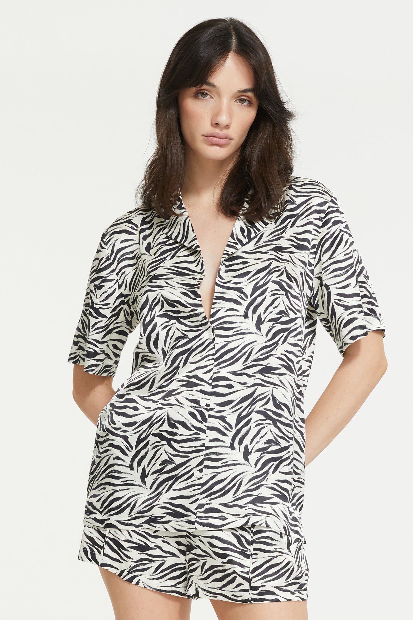 The Zafina Short Sleeve Top in Brush Zebra Print by Ginia