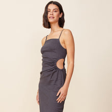 Detail view of model wearing the linen slip dress in faded black.