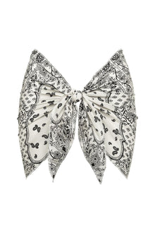 Black and white bandana sarong with ornate paisley and floral patterns tied at center.
