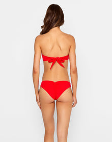 model is wearing the leopard love bandeau and skimpy bottom in red
top ties at back
gold ring hardware