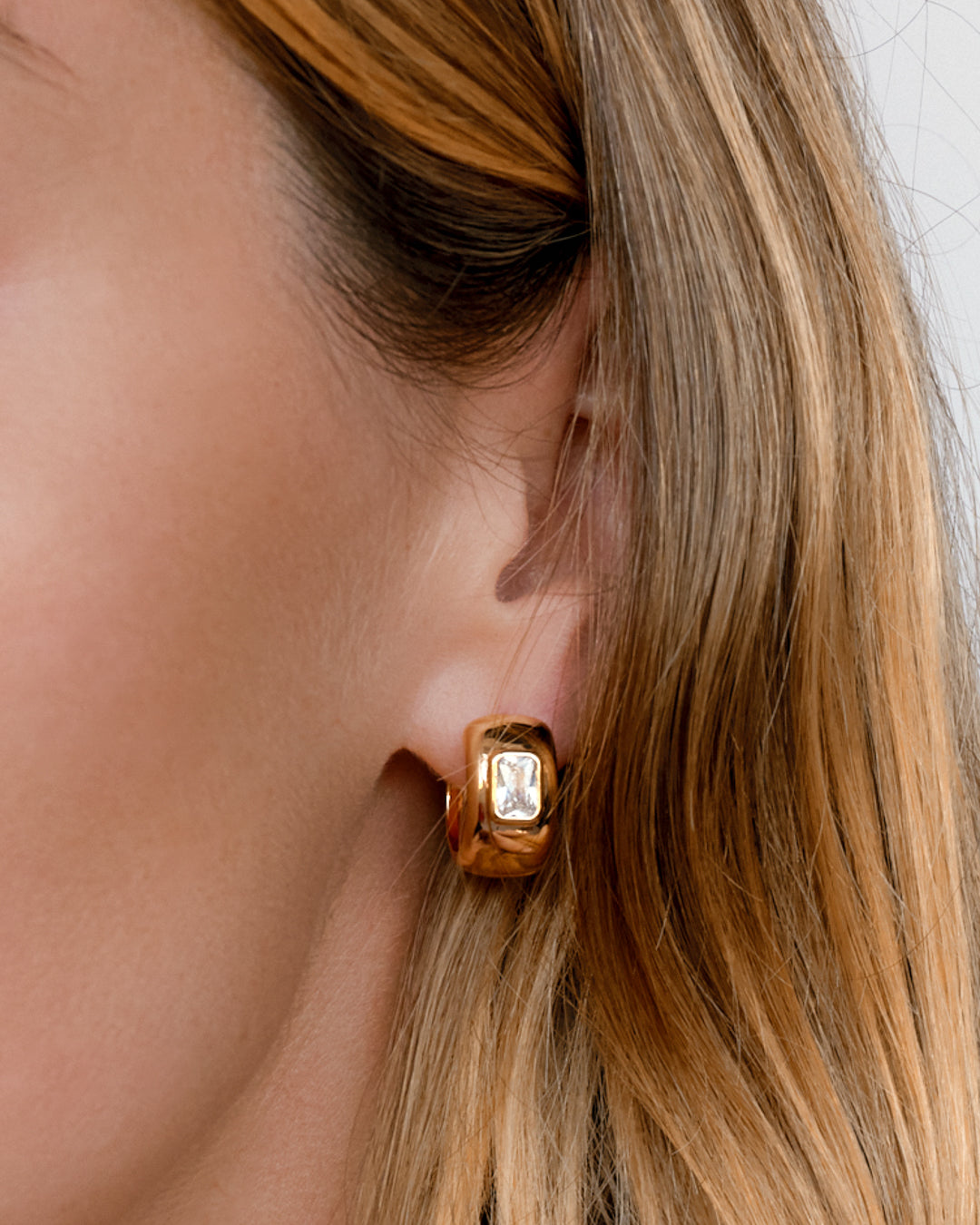 The Emerald Bezel Stone Huggies | Gold