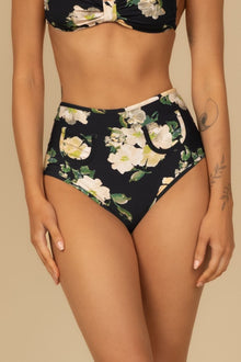 Black bikini bottom with white and yellow floral print, gold zipper detail on hips, high-waisted cut.