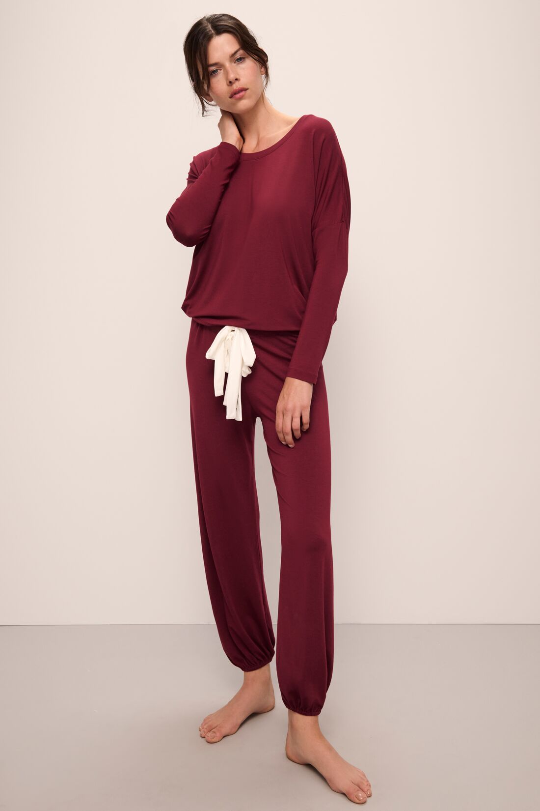 Model wears Gisele TENCEL Modal Slouchy PJ Set in Cabernet/Ivory.