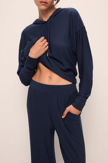 Model wears Softest Sweats Straight Leg Pant in Navy.