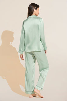 Model wears Inez Washable Silk Long PJ Set in Surf Spray/Agave.