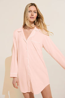 Model wears Gisele TENCEL Modal Sleepshirt in petal pink/ivory.