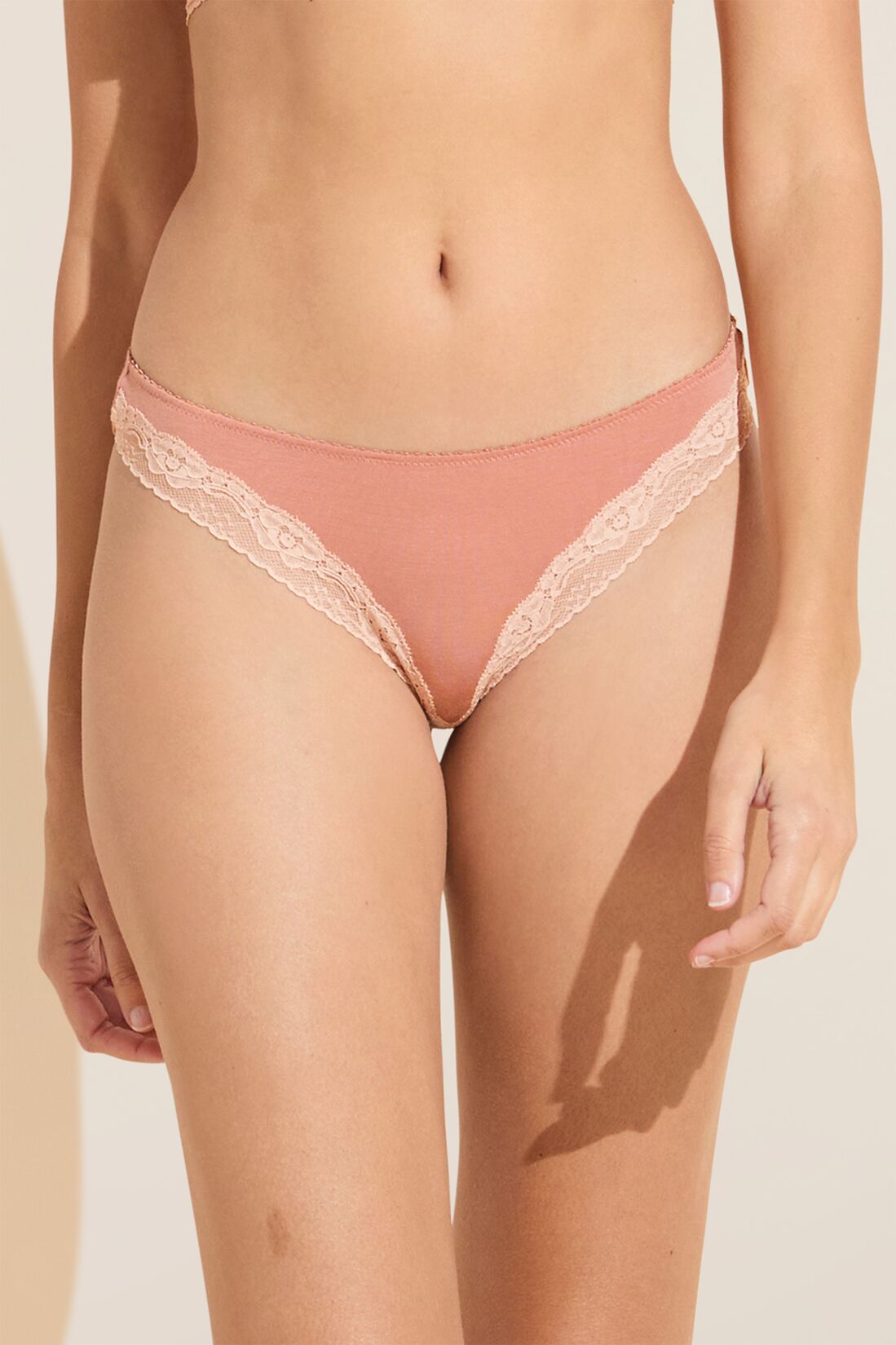 Model wears Flora TENCEL Modal Thong in Pink Rouge/Rose.