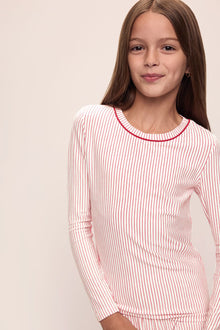 Model wears Kids Printed TENCEL Modal Unisex Long PJ Set in Duo Stripe Haute Red/Haute Red.