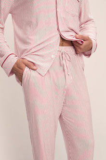 Model wears William Printed TENCEL Modal Long PJ Set in Duo Stripe Haute Red/Haute Red.