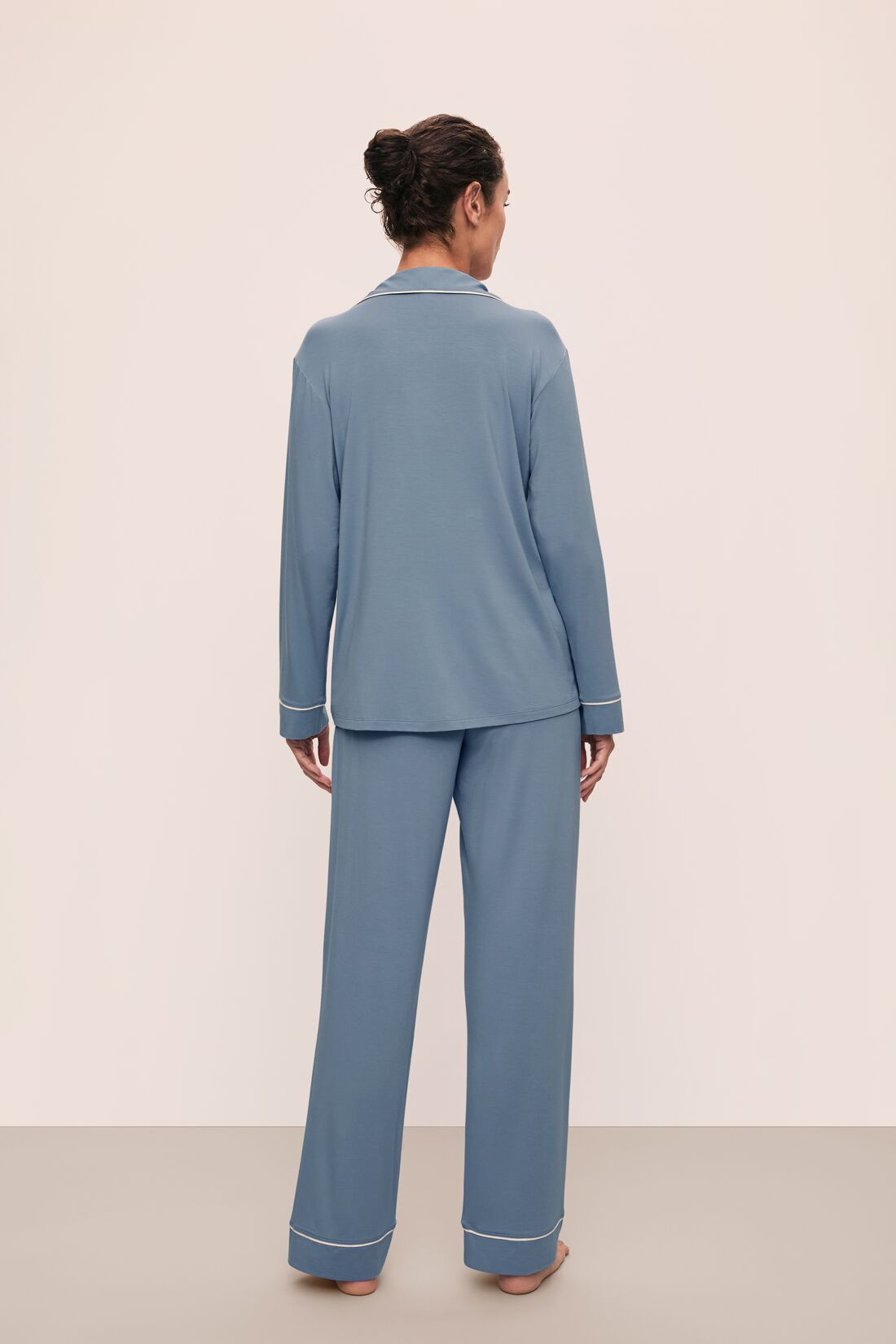Model is wearing Gisele TENCEL Modal Long PJ Set in Faded Denim/Ivory