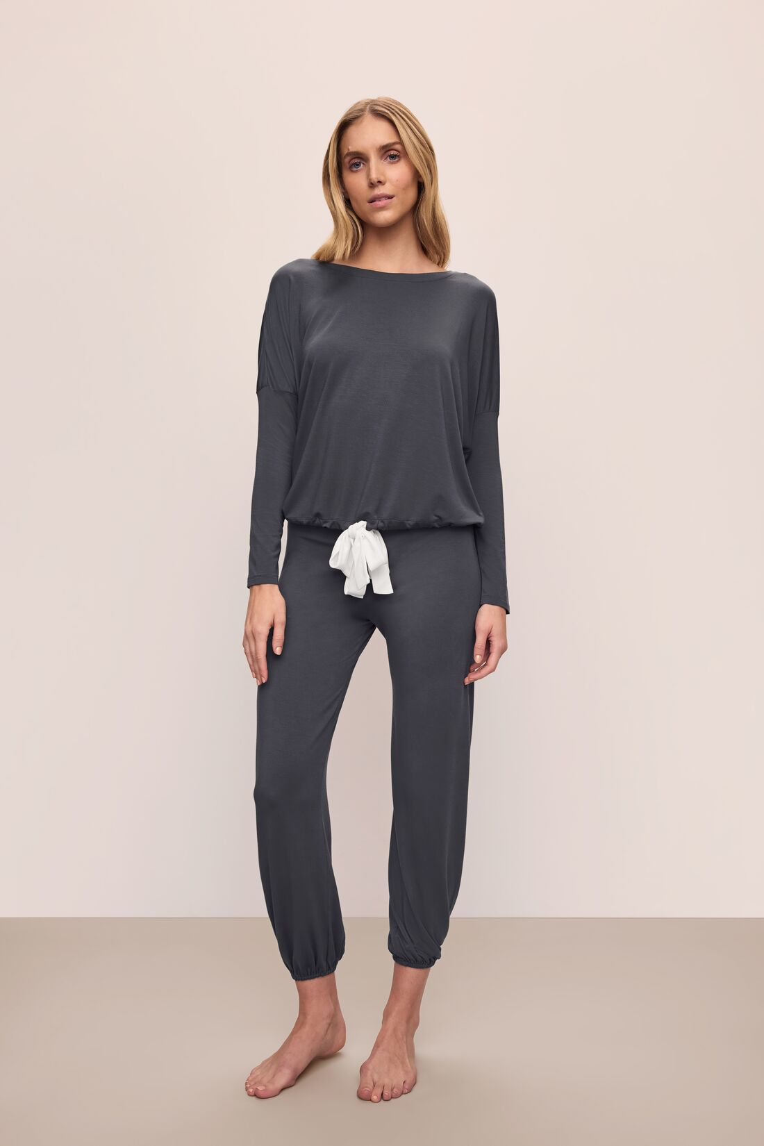 Model wears Gisele TENCEL Modal Slouchy PJ Set in Graphite/Ivory.