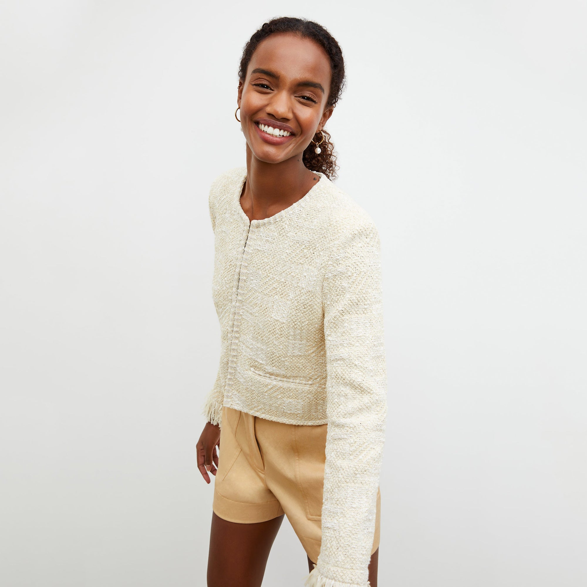 Side image of a woman wearing the Lilia Jacket - Interweave in Taupe / Ivory | Exclude