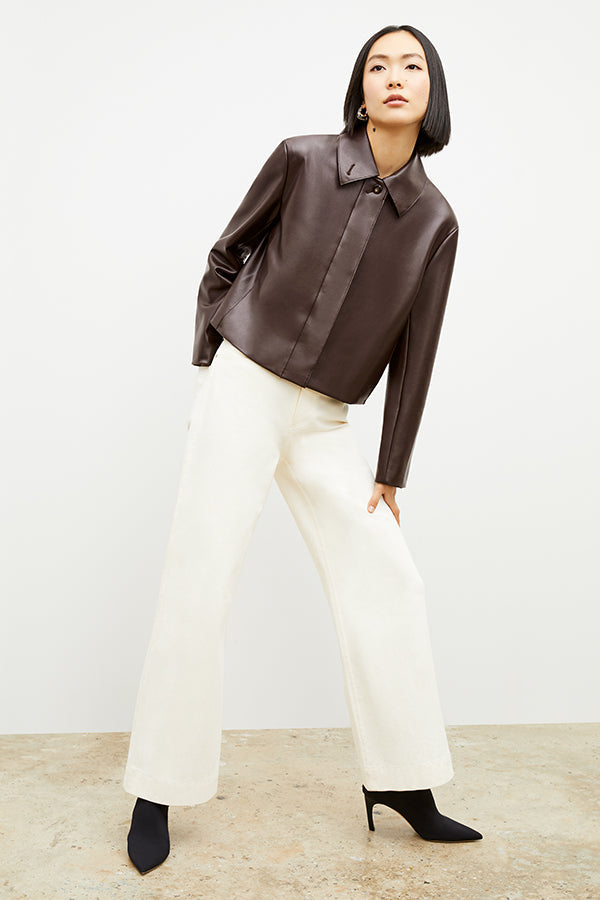 Front image of a woman wearing the nicky jacket in brown | Exclude