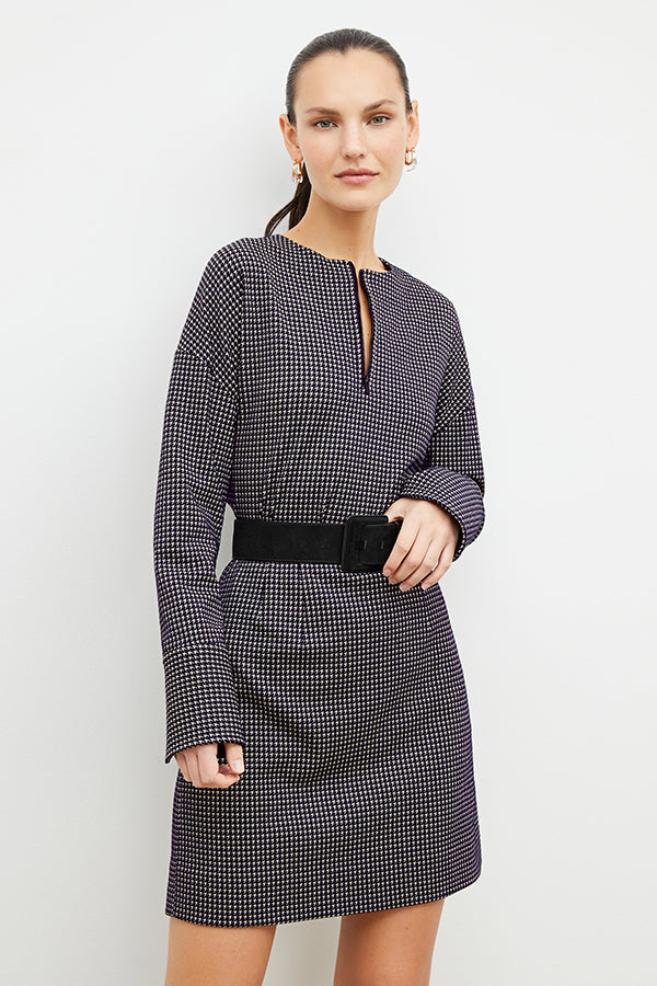 Front image of a woman wearing the whitney skirt in black and white | Exclude