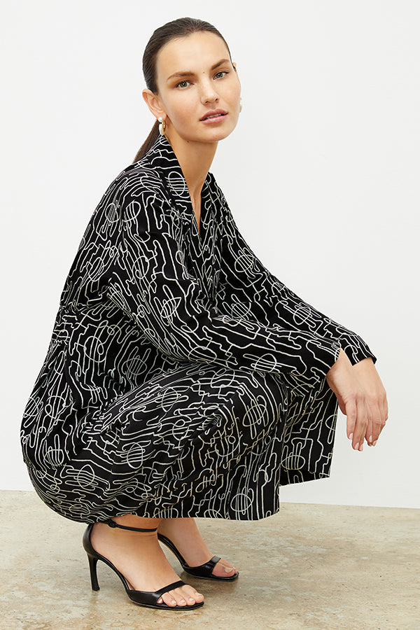 front image of a woman wearing the alyssa jacket in symphony print | Exclude