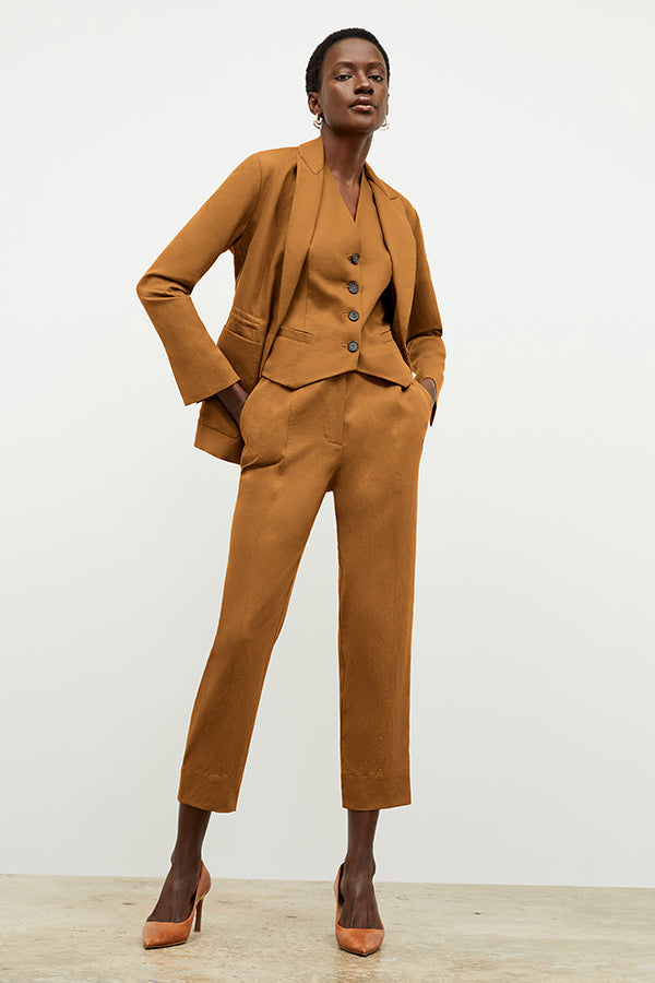 Front image of a woman wearing the Shane Pant in Acorn | Exclude | Grid