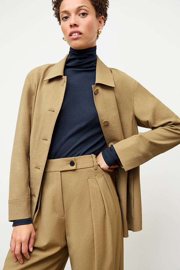 front image of a woman wearing the avelyn jacket in macaroon | Exclude | Grid
