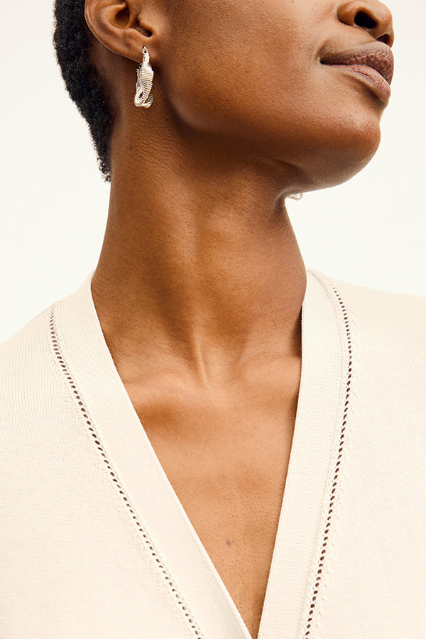 front image of a woman wearing the toula dress in ivory | Exclude | Grid Hover