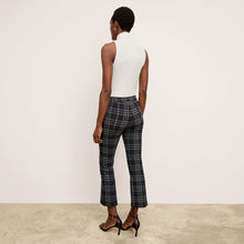image of a woman wearing the kick flare foster pant in plaid  