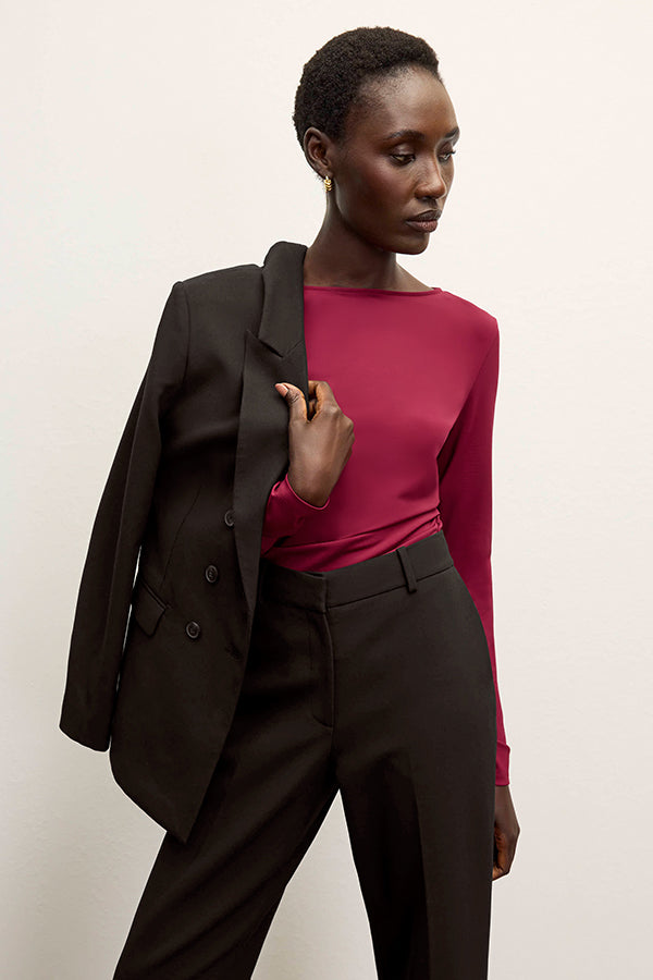 front image of a woman wearing the kati jacket in black | Exclude