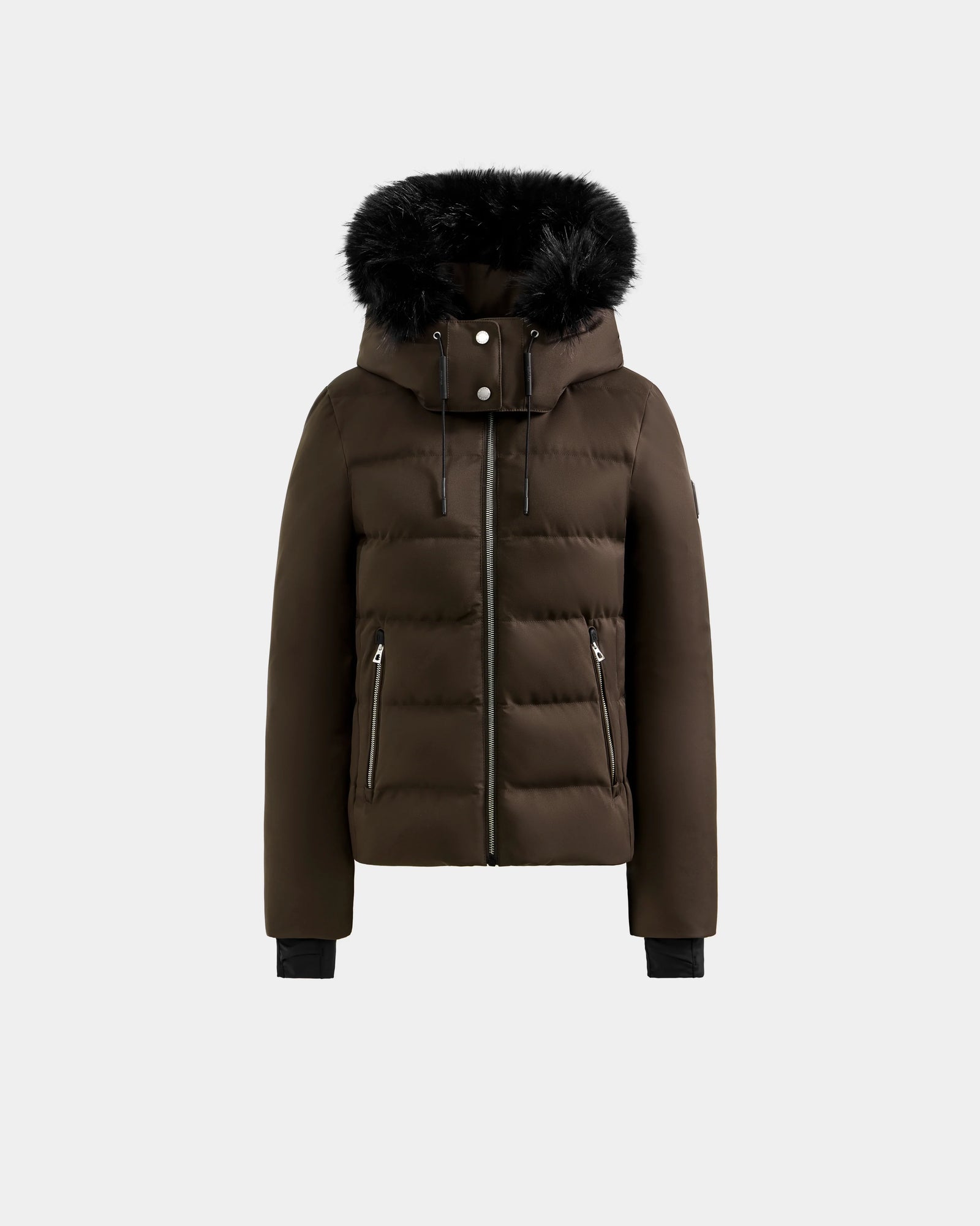 The MIRRY M - L124533 Espresso by Rudsak is a brown quilted women’s down coat with a black faux fur-trimmed hood, front zipper, snap buttons, zippered side pockets, and ribbed black cuffs—ideal for winter.