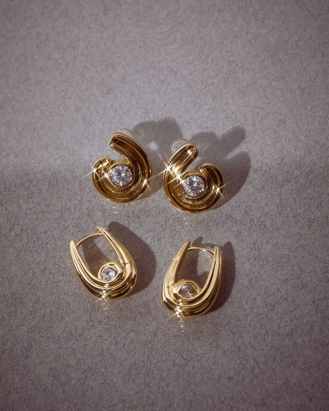 Wave Bezel Twist Studs | Silver | Cubic Zirconia