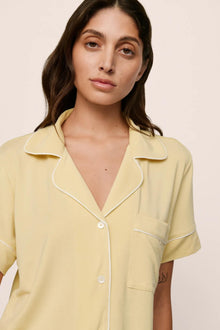 Model is wearing Gisele TENCEL Modal Relaxed Short PJ Set in  Sunrise/Ivory