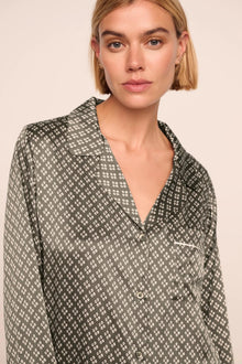 Model is wearing Inez Washable Silk Printed Long PJ Set  in Petite Batik Smokey Olive/Ivory